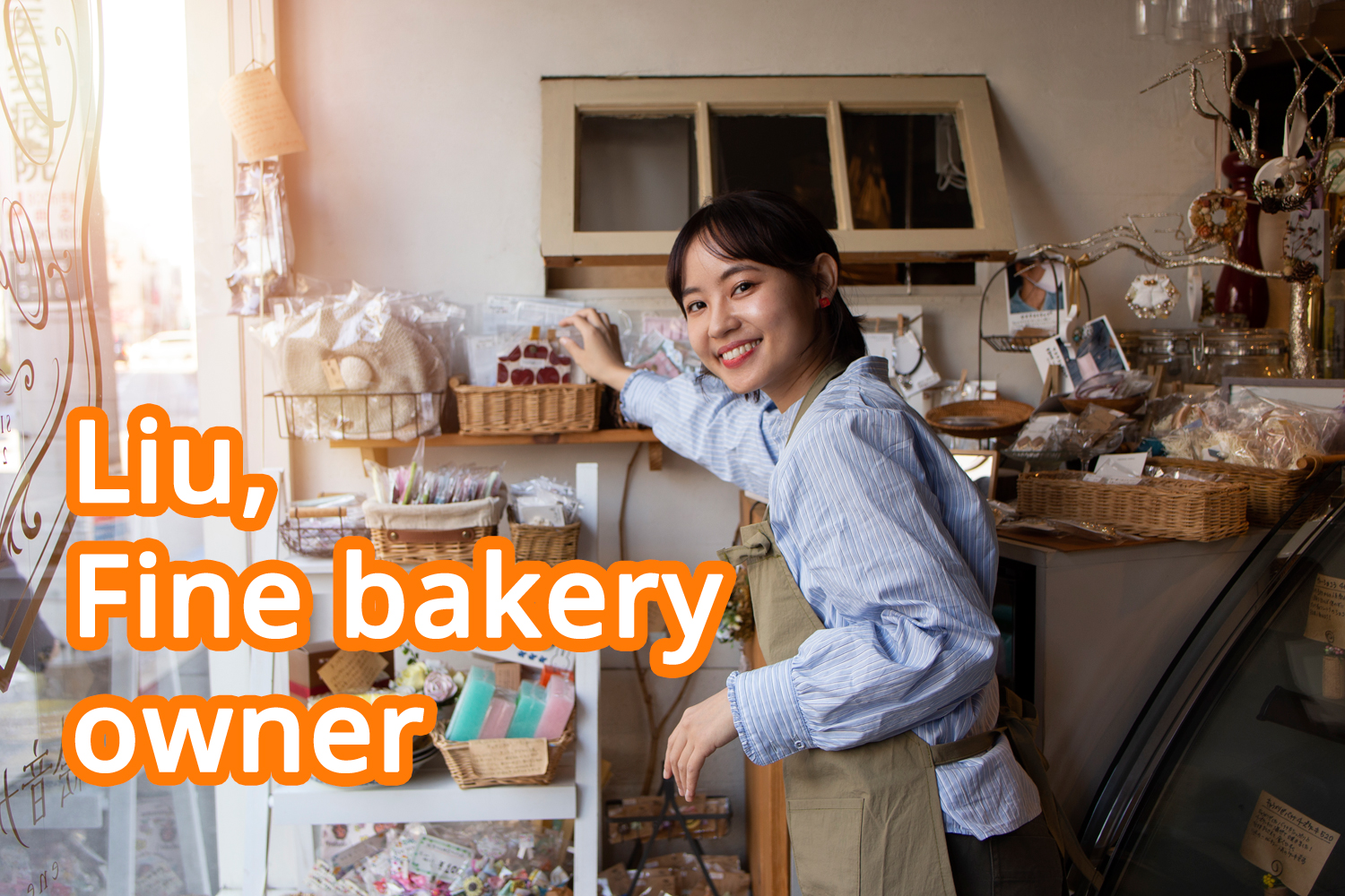 Young Asian woman arranging her cake shop